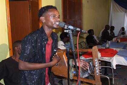 Musician playing the Krar at the wedding feast - Keren Eritrea.