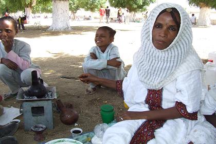 Coffee ceremony with with a Keren family in the shade of a tree - Festival of Mariam Dearit - Keren Eritrea.