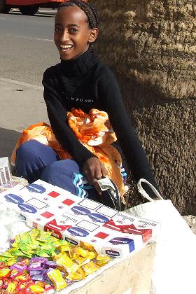 Girl selling cigarettes and candy - Asmara Eritrea.
