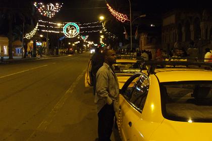 Taxi drivers waiting for customers - Harnet Avenue Asmara Eritrea.