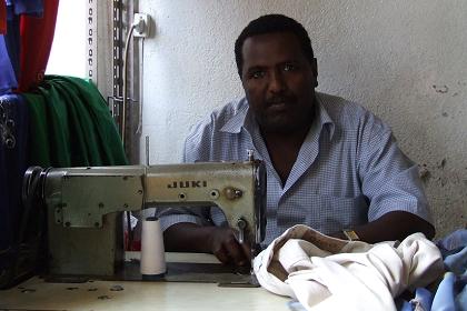 The taylor fixing my trousers - Asmara Eritrea.