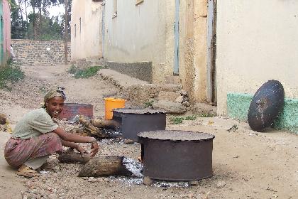 Woman preparing suwa - Mai Temenai Asmara Eritrea.