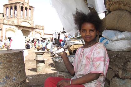 Young girl selling spices - Medeber markets Asmara Eritrea.