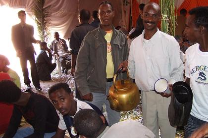 Serving suwa at the wedding - Mai Chehot Asmara Eritrea.