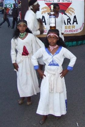 Traditionally dressed girls, performing as dancers - Independence Day carnival - Asmara Eritrea.