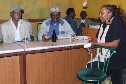 Rita and her happy guests - Bar Gurgusum Asmara Eritrea.