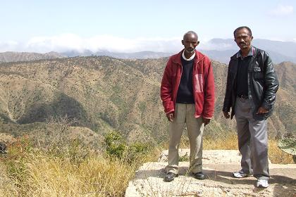 Our Guide and Mr. Tekeste on the foundation of the former Ropeway - Martyrs Park - Asmara Eritrea.