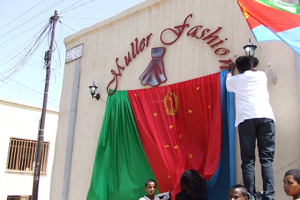 Staff decorating Muller Fashion Shop - Mereb Street Asmara Eritrea.