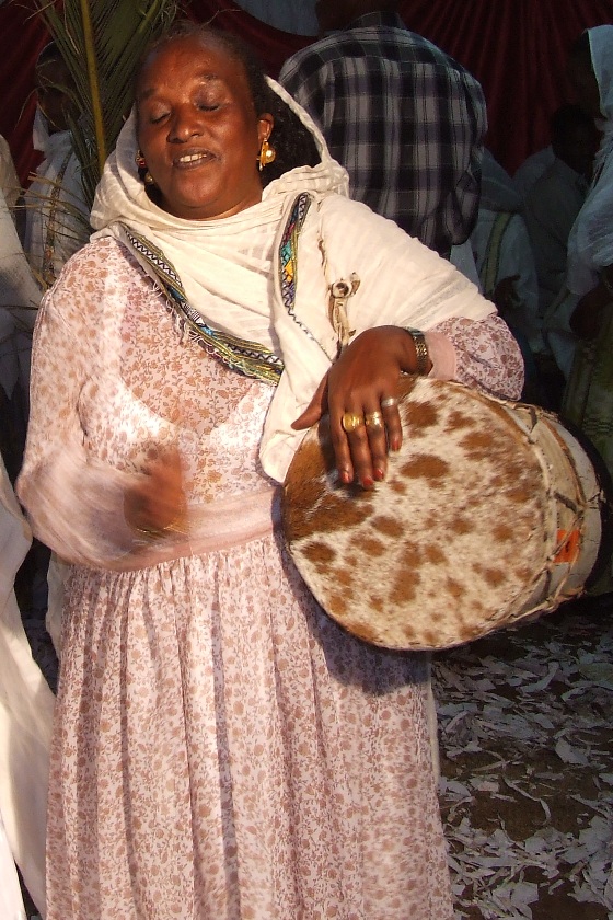 Woman playing the koboro a traditional drum - Edaga Arbi Asmara.