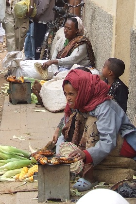 Women selling roasted maize - Bus stop to Keren Asmara Eritrea.