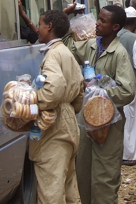 Boys selling bread - Bus stop to Keren Asmara Eritrea.