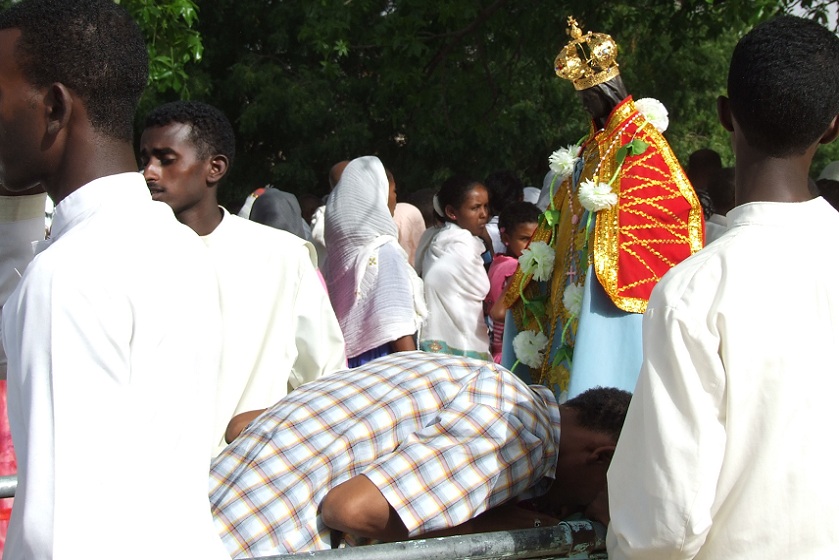 People praying in front of the Madonna - Mariam Dearit Keren Eritrea.
