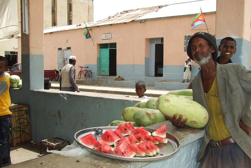 Men selling sliced water melon - Keren Eritrea.