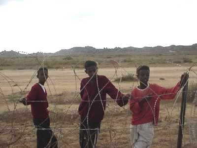 Local children looking in - Dekemhare January 2001