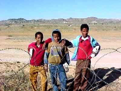 Local children looking in - Dekemhere December 2000